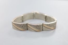 A 20th century white and yellow metal (stamped 925 & 375) demi-lune link bracelet, 21cm, gross 50.