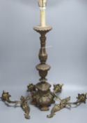 A pair of rococo style twin light wall sconces, and an Italian period style giltwood table lampm