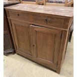 A 19th century Continental oak side cabinet