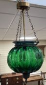 A ribbed green glass ceiling shade, height 50cm