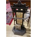 A Victorian style painted cast iron stick stand with tile inset back, width 40cm, depth 21cm, height