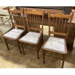 Three oak dining chairs