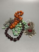 A turquoise bead necklace and pair of earrings, two other necklaces and two brooches including