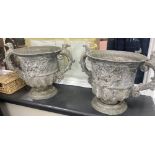 A pair of 19th century cast lead two handled garden planters, width 54cm, height 39cm