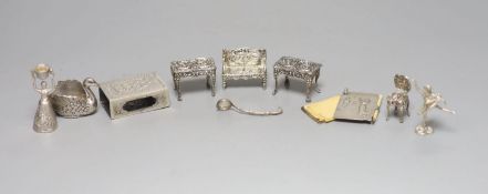 An Edwardian miniature silver model of a settee, two later chairs and a table and five other