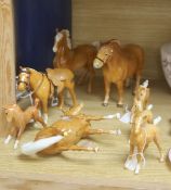 Eight Beswick Palomino horses