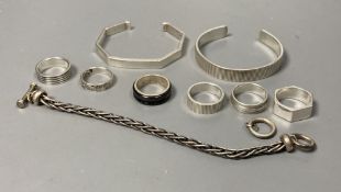 Two white metal bangles, one stamped Tiffany & Co with similar ring, five 925 rings, and a 925