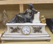 A 19th century gilt metal and marble figural mantel clock, length 58cm