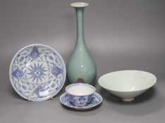 A Chinese celadon glazed vase, height 28cm, together with a crackle glaze bowl, a blue and white