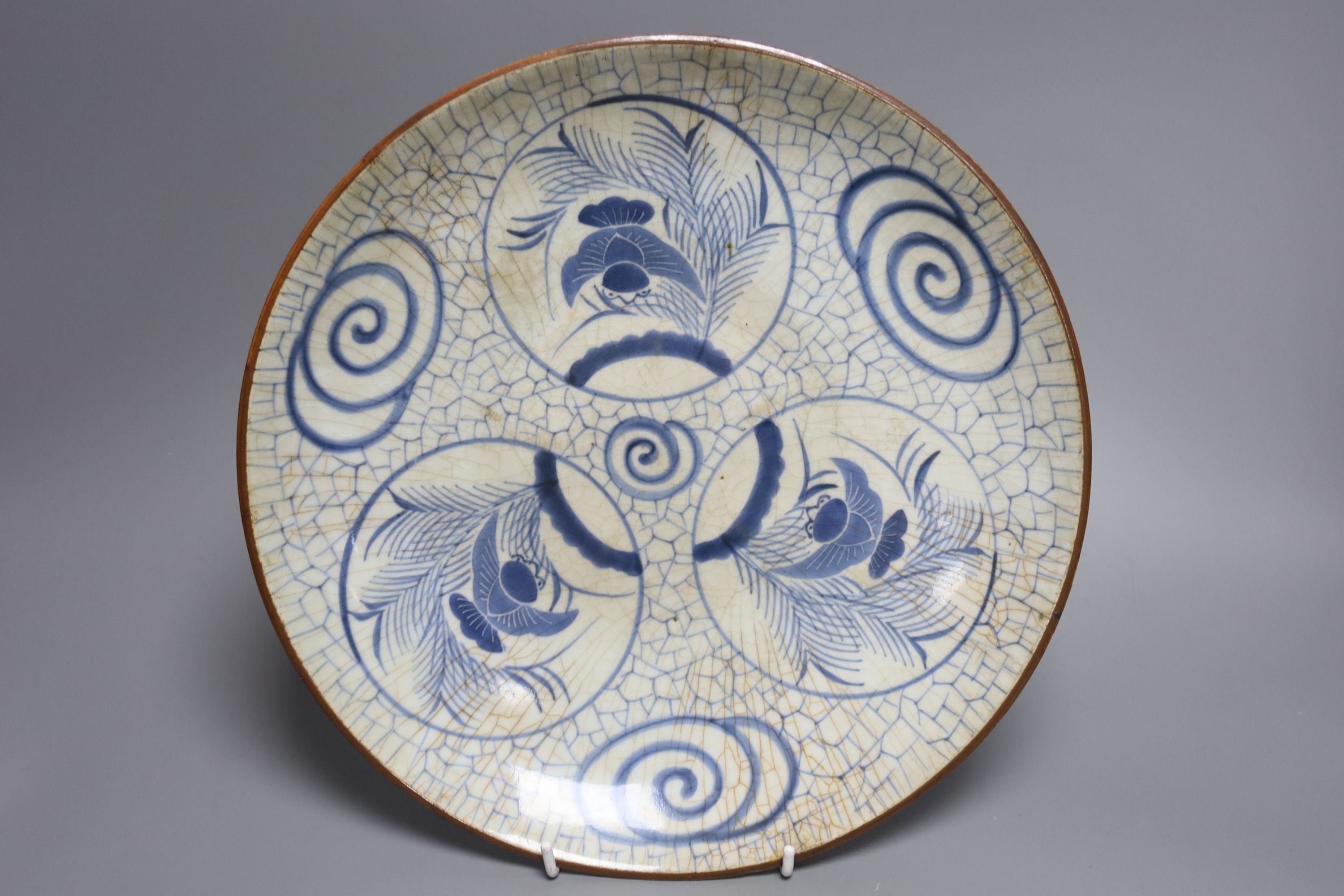 A Japanese crackle glazed dish, another similar and a Chinese celadon glazed dish, largest - Image 6 of 6