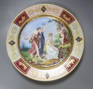 A large early 20th century Vienna style hand painted charger, diameter 37.5cm