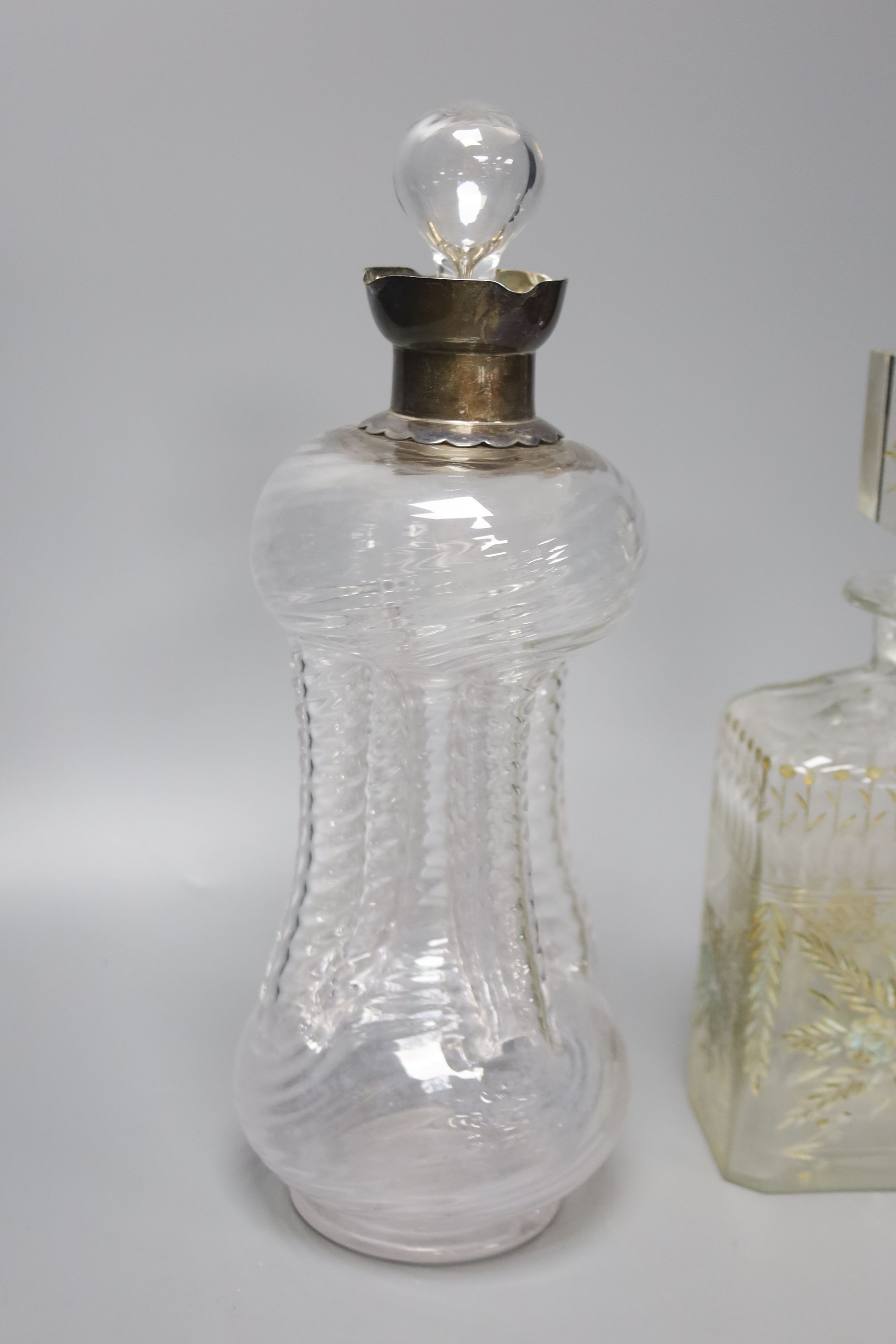 A Victorian wrythen moulded hour glass shaped decanter, with silver collar, 31cm high, togoether - Image 3 of 4