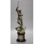A spelter figure of St George and the Dragon, on turned marble base with vacant silver cartouche,