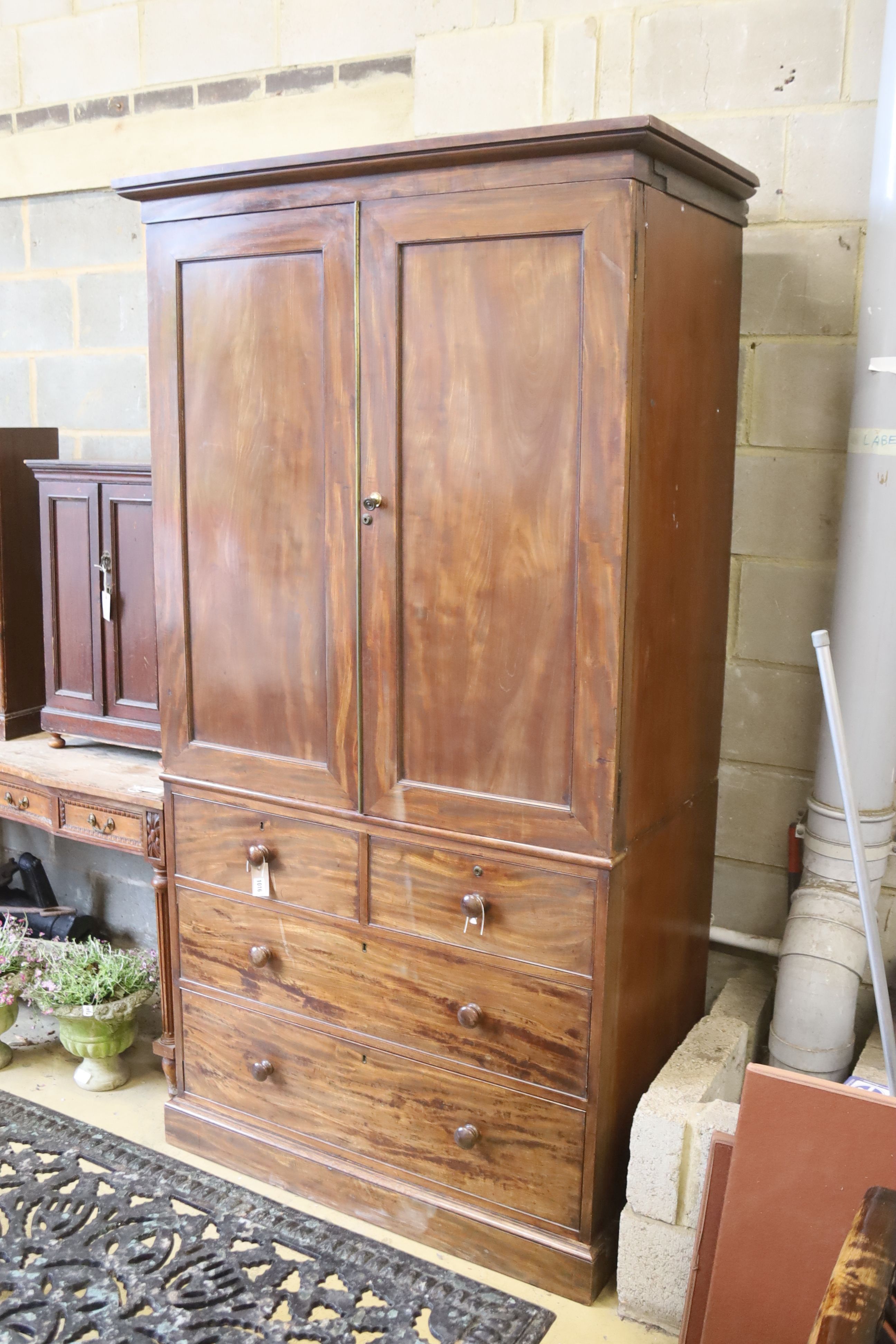 A Victorian mahogany linen press, formerly part of a larger wardrobe, width 112cm. depth 66cm.