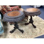 A near pair of 19th century Indian padouk tripod tables, 62cm diameter, height 70cm