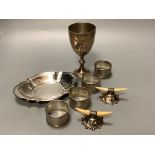 A set of four Edwardian engine turned silver napkin rings, Birmingham 1905, a pair of silver and