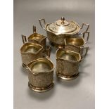 A Persian white metal sugar bowl and cover and five matching tea glass holders,gross 16.5oz.