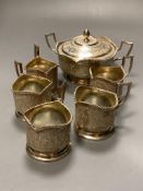 A Persian white metal sugar bowl and cover and five matching tea glass holders,gross 16.5oz.