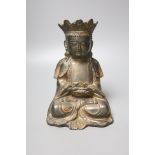 A Chinese gilt lacquered bronze figure of a seated and crowned Buddha, Ming dynasty or later, 21cm