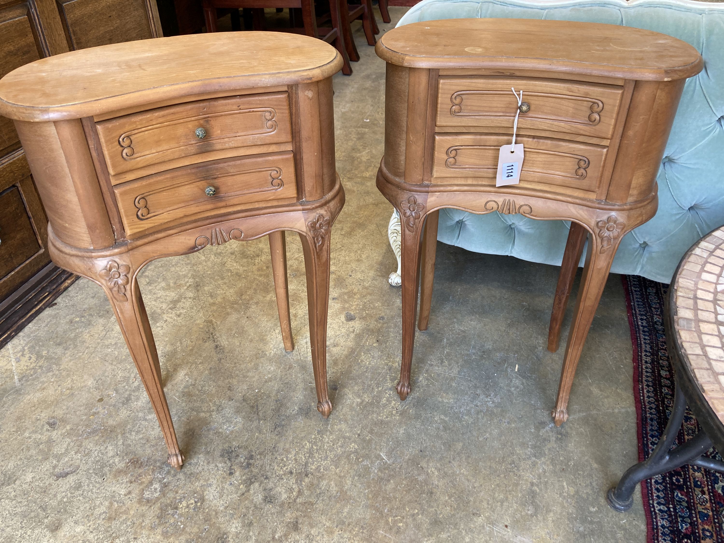 A pair of Louis XVI design walnut kidney-shaped bedside chests, width 45cm, depth 26cm, height 66cm