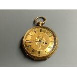 An 18k yellow metal open faced pocket watch, case diameter 38mm, gross 47 grams.