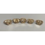 Four assorted modern 9ct gold 'Signs of the Zodiac' rings and one similar 9ct ring,11.2 grams.