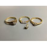 Three assorted 18 carat gold and diamond set dress rings, gross 8.3 g and yellow metal and diamond
