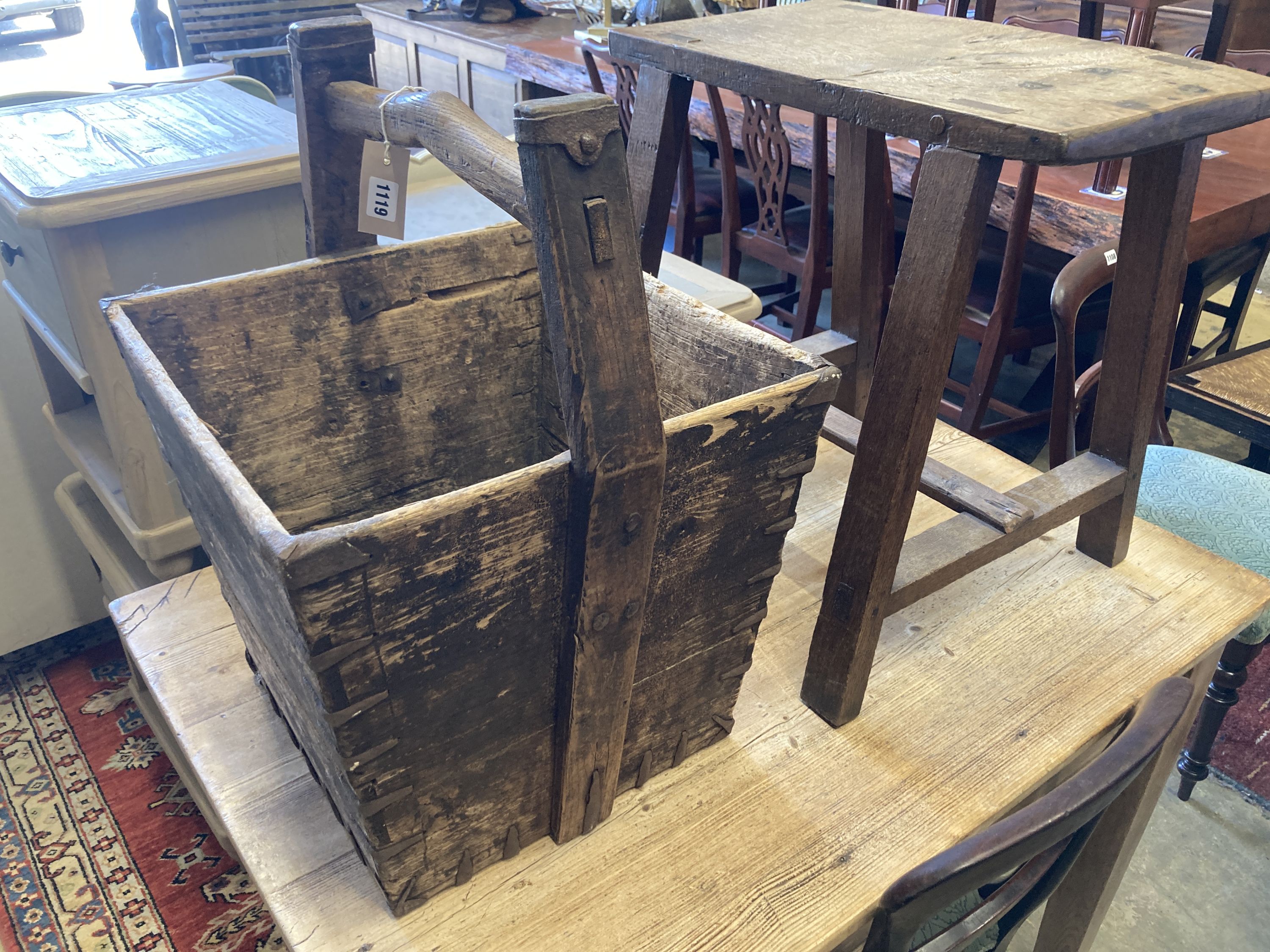 A rectangular provincial oak low table, width 55cm, depth 32cm, height 55cm together with a square