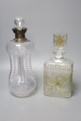 A Victorian wrythen moulded hour glass shaped decanter, with silver collar, 31cm high, togoether