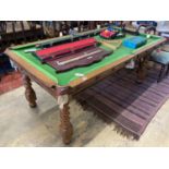 An early 20th century oak Jelks & Son snooker/dining table with full accessories, length 200cm,