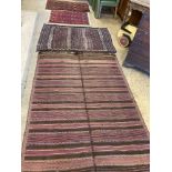 Two early 20th century flatweave rugs, a Bokhara rug and a Belouch rug, largest 220 x 160cm