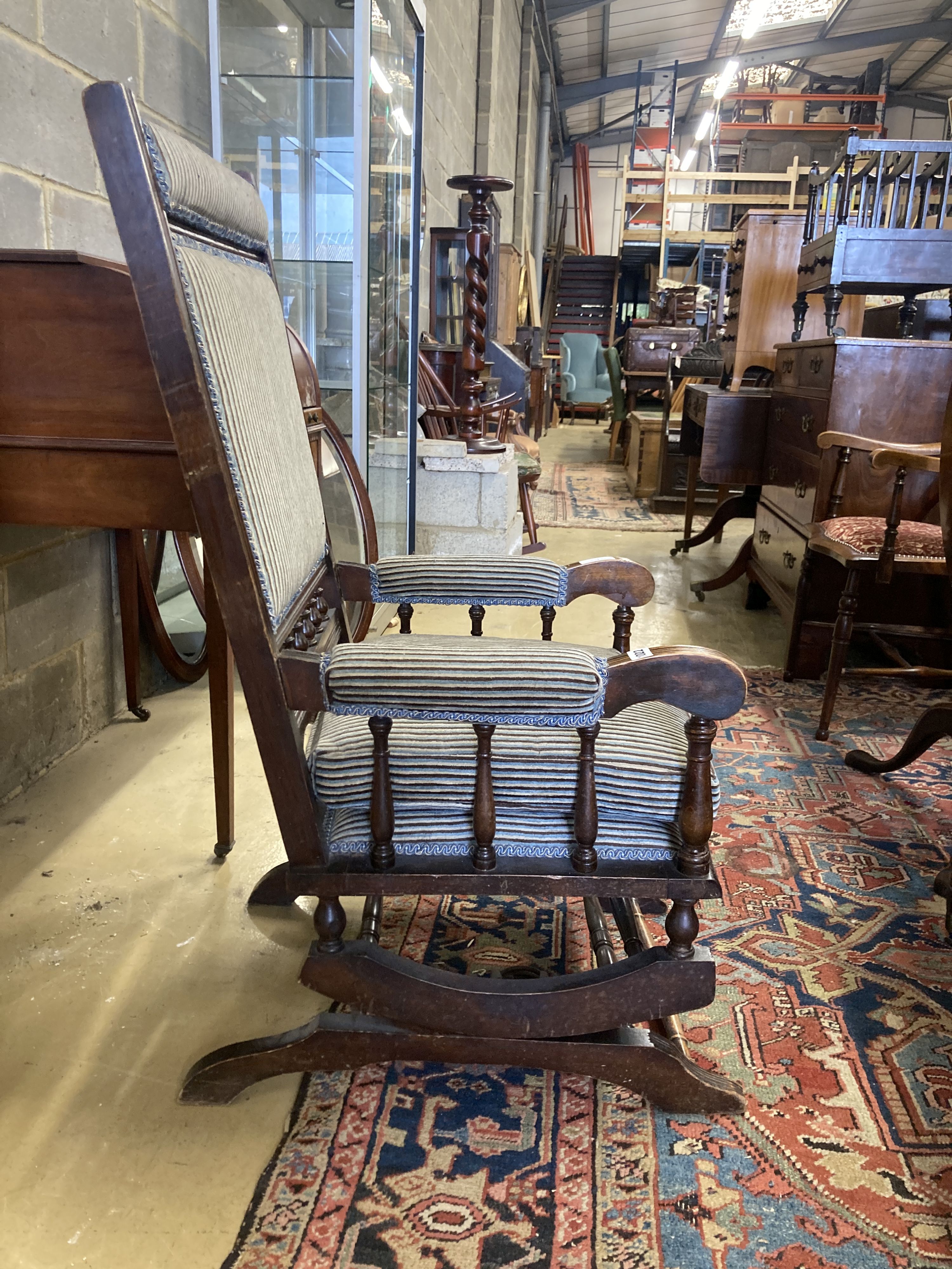 An early 20th century American mahogany rocking chair, width 60cm, depth 52cm, height 108cm - Image 3 of 4