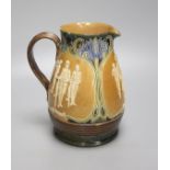 Cycling Interest: A Doulton Lambeth stoneware jug, c.1900, 21cm high