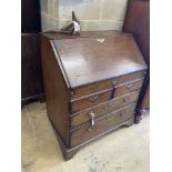 A George II oak bureau, width 89cm, depth 52cm, height 104cm