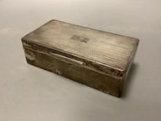 A George V engine turned silver rectangular cigarette box, Birmingham 1928,17.3 cm.