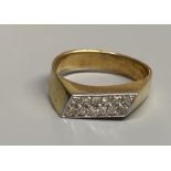 A modern 18k yellow metal and pave set two row diamond ring, size L/M, gross 4.8 grams.