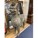 A faux carved marble temple dog, width 86cm, height 110cm