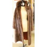 A dark brown mink coat