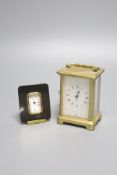 A brass carriage timepiece and a Matthew Norman timepiece