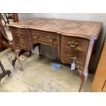 A Queen Anne revival mahogany and walnut breakfront serpentine side table, width 106cm, depth