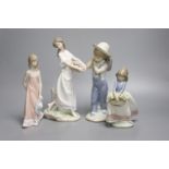 A Lladro figure of a boy "Flower Harvest" No. 1286, "May Flowers", Girl with Straw Hat, and '