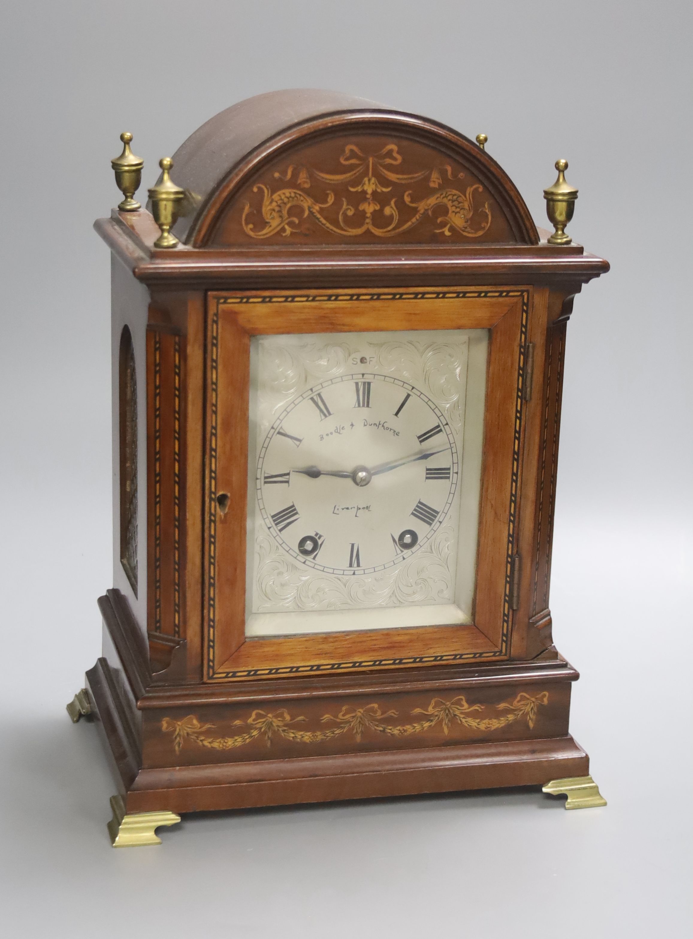 An inlaid mahogany eight day bracket clock, the silvered 3.5 inch dial later marked Boodle &