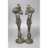 A pair of spelter figural water carriers, 42cm high