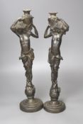 A pair of spelter figural water carriers, 42cm high