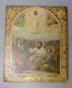 A Russian Icon, painted and gilt gesso panel, of six figures within an arched vignette