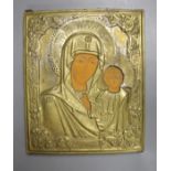 A 20th century Russian pressed metal Icon, the Madonna and child with painted detail, 31 x 26cm