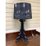 A Philippe Starcke black plastic table lamp with shade, height 76cm