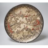 A Chinese laquer dish, carved with storks in a landscape, six character Zhengde marks, 34.5cm