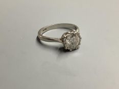 A white metal (stamped platinum) and solitaire diamond ring, size N, gross weight 4.5 g,The stone