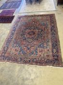 An early 20th century Heriz pale blue ground carpet, 314cm, width 232cm